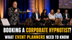Corrie J performing a comedy hypnosis show for corporate event guests
